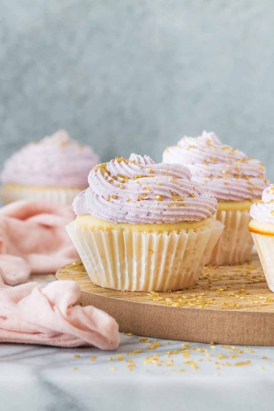 https://www.strawberryblondiekitchen.com/wp-content/uploads/2019/04/Lavender-Mimosa-Cupcakes-1581_hero.jpg